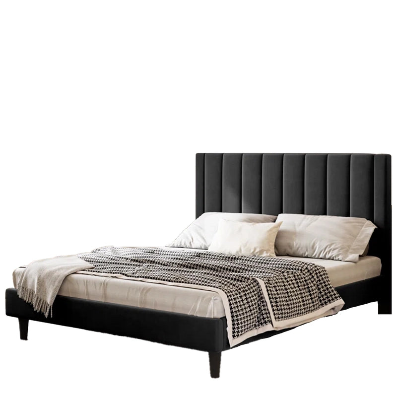 This king-sized upholstered bed brings modern comfort to urban interiors. 