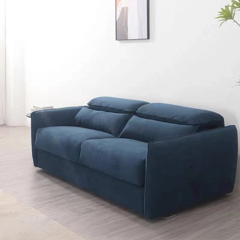 With its boxy silhouette, deep-cushion seating, and adjustable dual headrests, the design supports comfort in both seated and sleeping modes.