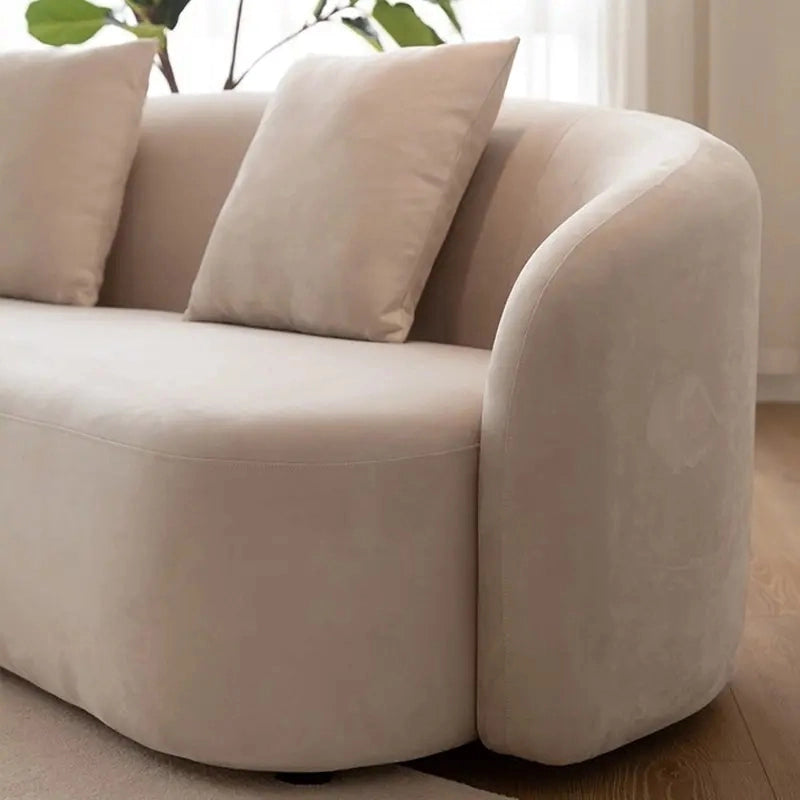 The Lureth curved three-seater couch is crafted for discerning interiors.