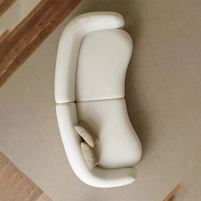 This sculptural 3 seater couch balances modern artistry and everyday comfort.