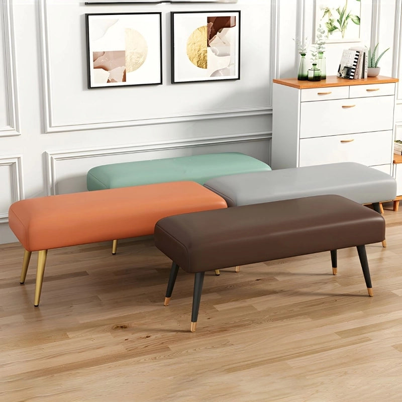 Its solid build includes tapered metal legs with gold tips, adding polish to its Scandinavian profile. 