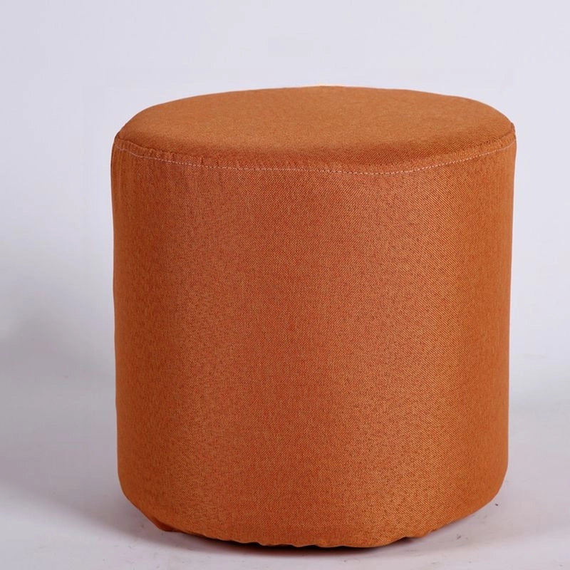 Orange pouf seating with pouffe stool and pouffe seat, cushioned round top