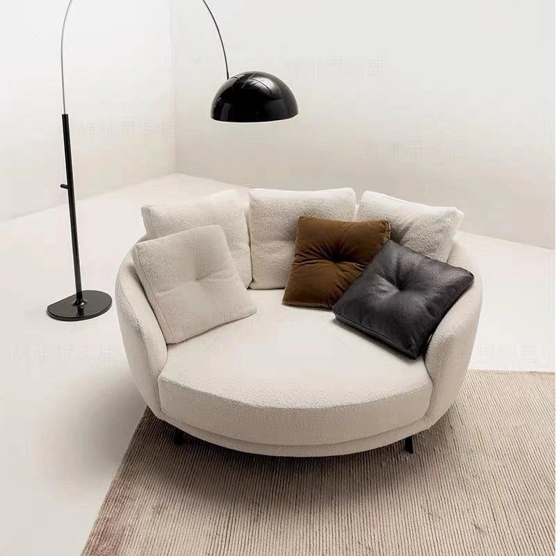 The Rigel is a thoughtfully designed rounded armchair built for deep lounging and aesthetic harmony.