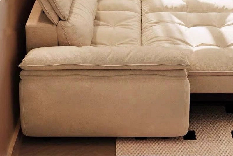 Its adjustable headrests and plush biscuit-tufted cushions enhance relaxation during both sitting and sleeping