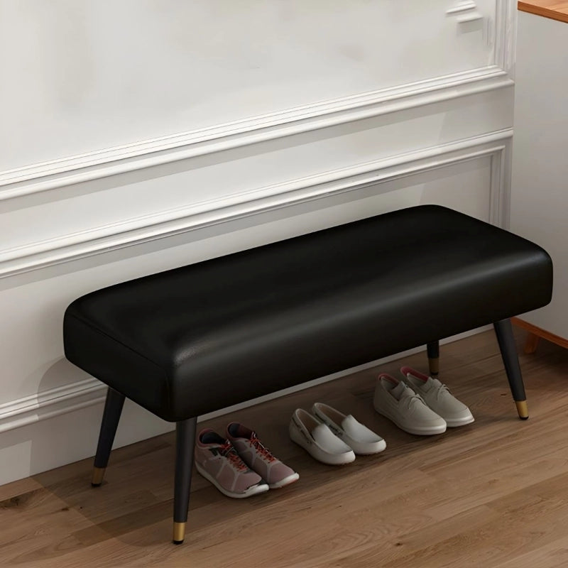 Sleek silhouette in black faux leather, merging bedroom bench and 2 seater bench use