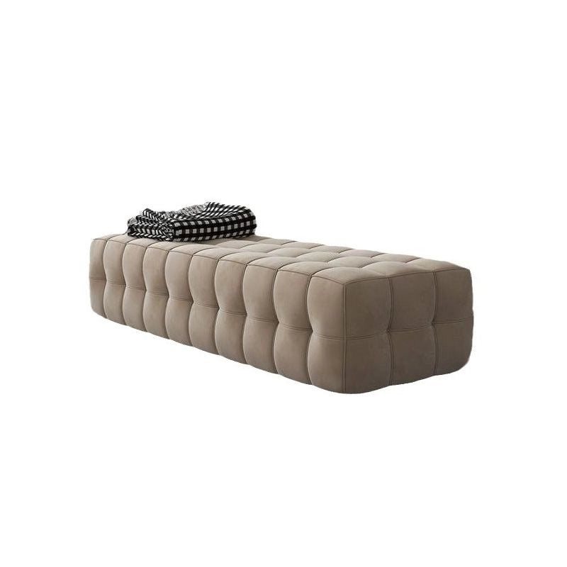 Upholstered in Nova fabric tones like beige and taupe, it blends into soft, sophisticated spaces. 