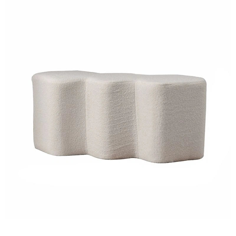 The dense bouclé fabric adds texture and comfort while retaining a minimal look fit for Scandinavian and Japandi interiors