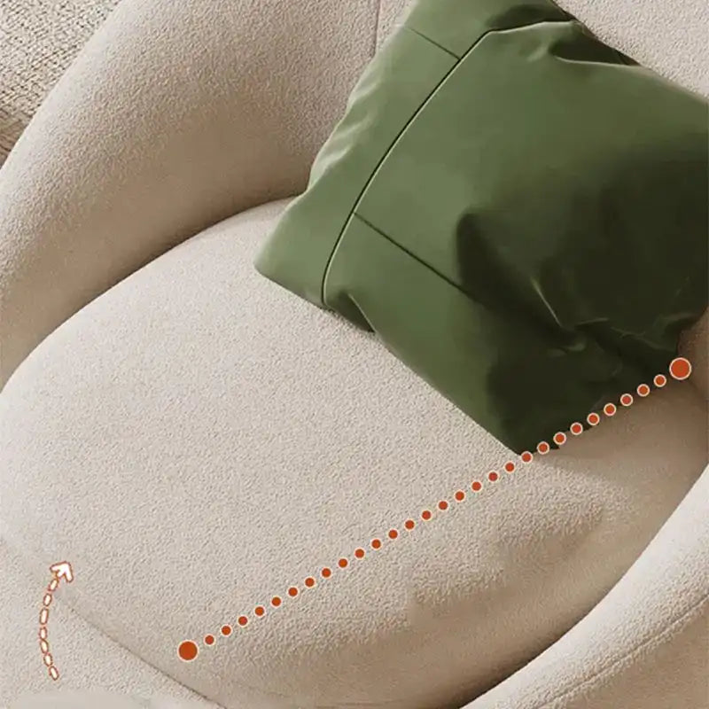 The Ovaro armchair from Kate and Mark captures the essence of modern Scandinavian design with its rounded, barrel-style silhouette and deep, cushioned seat.