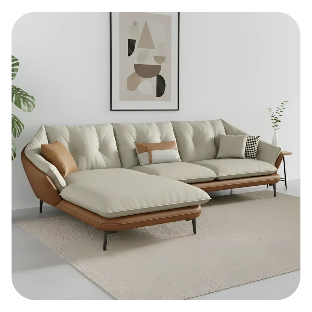 Modern living room with a white sofa, round marble coffee table, and decorative elements.