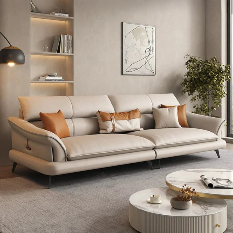 Front angle view of Mesa L Shape Sofa Set in caramel brown faux leather upholstery featuring modern corner sofa layout, luxury sofa comfort, 5 seater sofa capacity, deep seating, black metal legs, premium couch set styling and contemporary living room sofa design