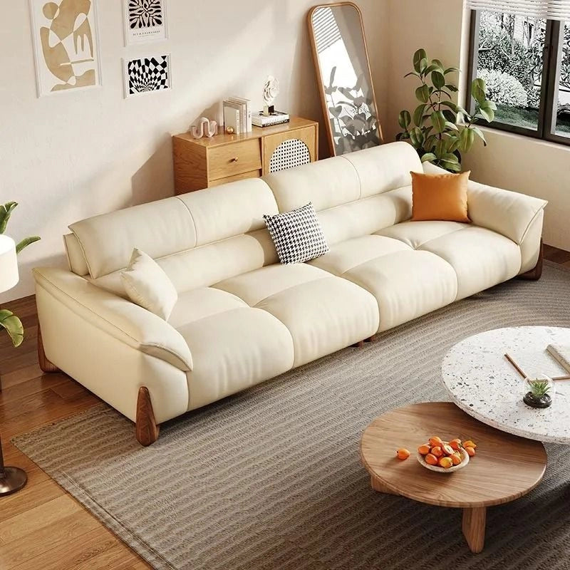Front angle view of Oviedo Leather Sofa Set featuring premium leather upholstery, luxury leather couch comfort, modern living room sofa styling, deep cushioned seating and elegant wooden legs