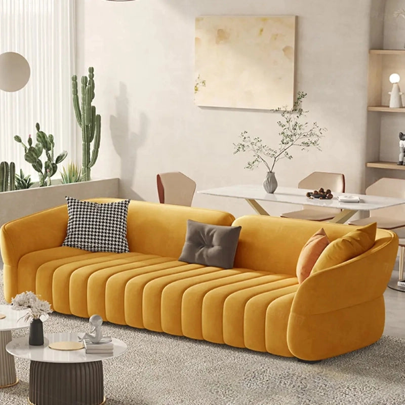 Tuscany velvet sofa featuring elegant vertical channel tufting, designer sofa styling, and modern living room sofa appeal for luxury homes.