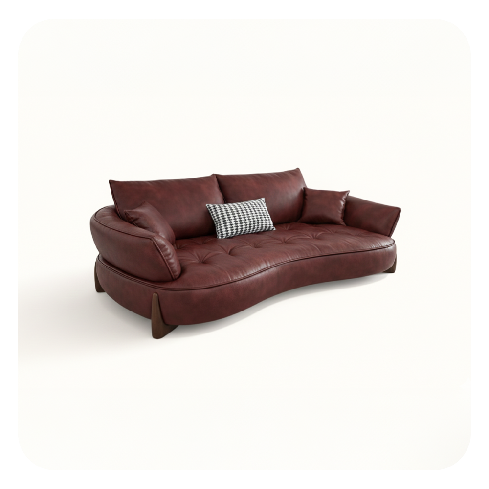 Modern living room with a white sofa, round marble coffee table, and decorative elements.