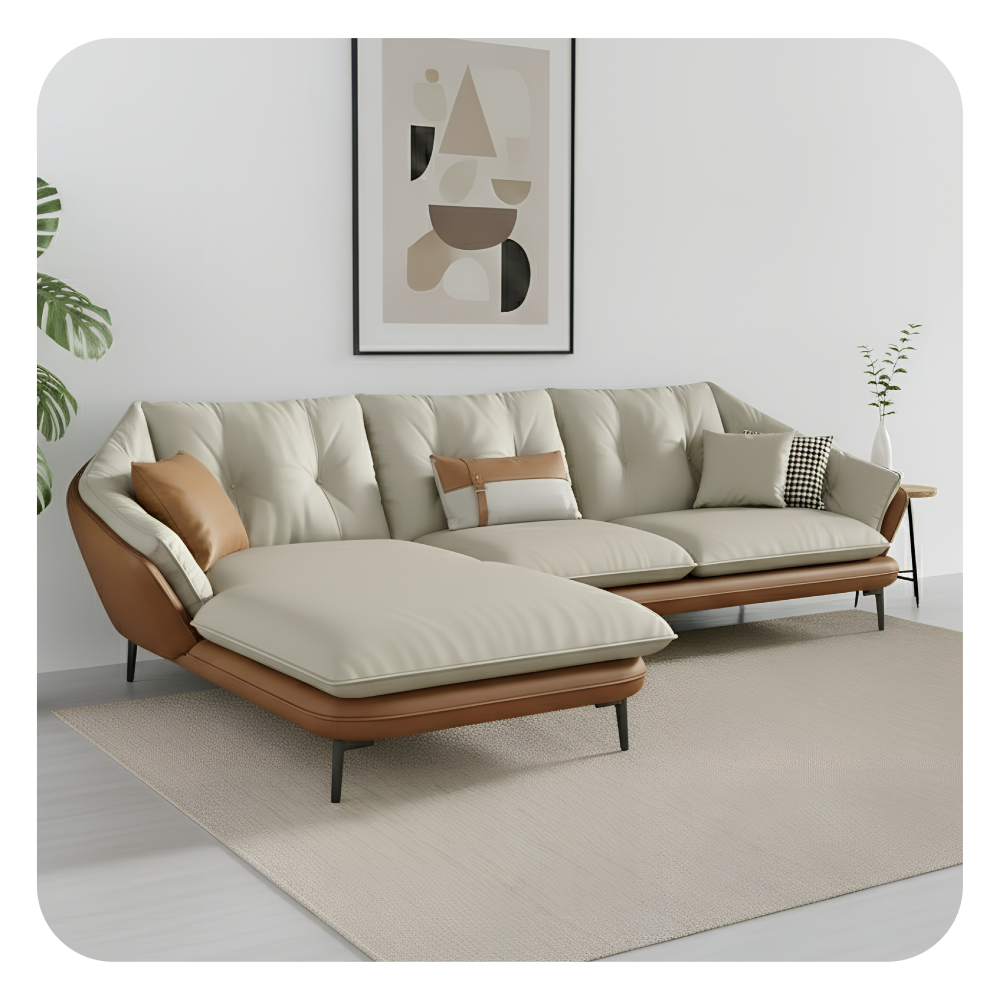 Modern living room with a white sofa, round marble coffee table, and decorative elements.